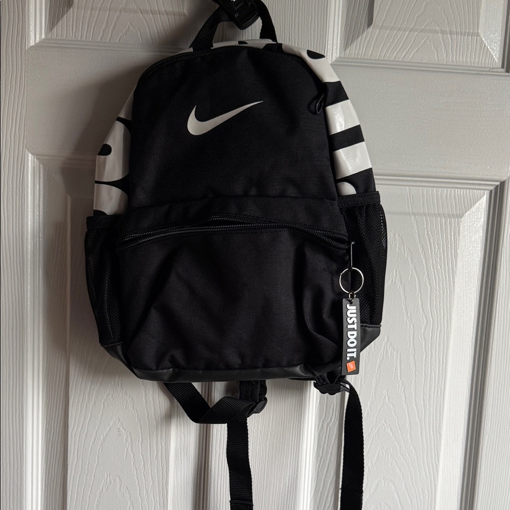 Nike Black and White Swoosh Backpack with 'Just Do It' Keytag